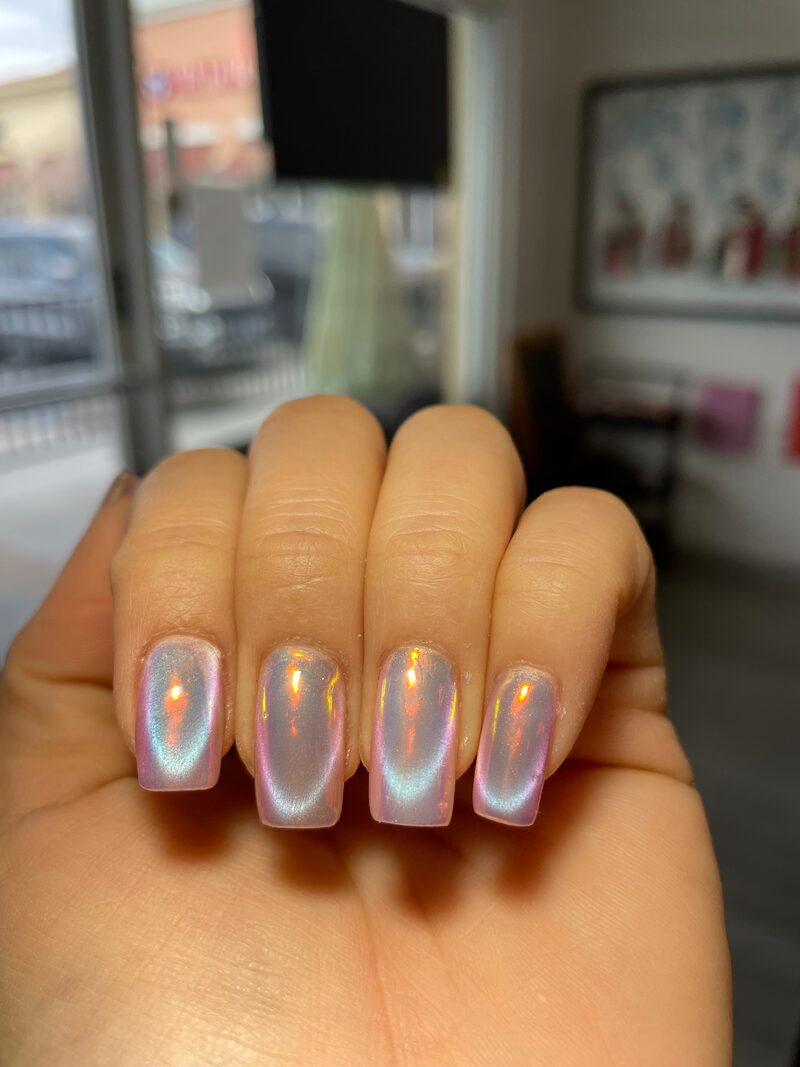 Holographic iridescent pink nails with chrome finish