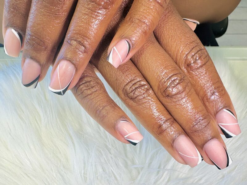 Nude french tips with black and white geometric line art