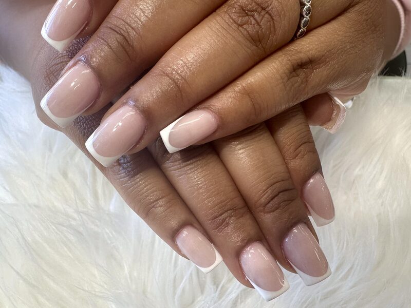 Classic nude pink square nails with sharp white french tips