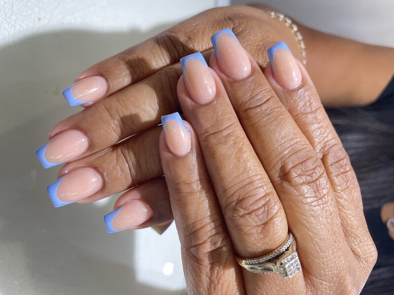 Light pink nails with deep burgundy french tips